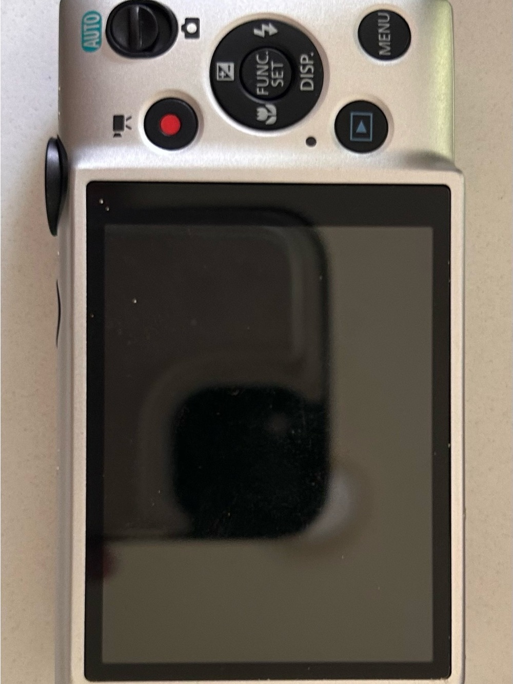 Canon compact camera image in silver and black tones - Picture 2 of 4